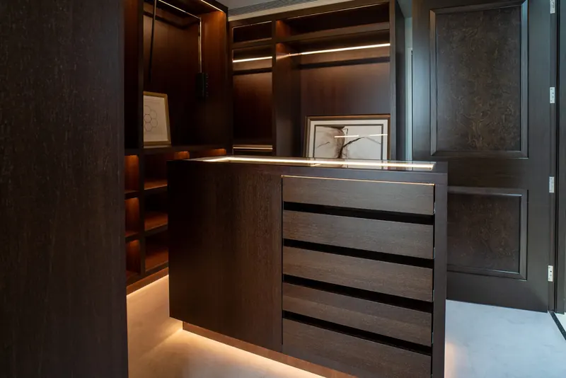Bespoke dark timber wardrobe joinery with drawers