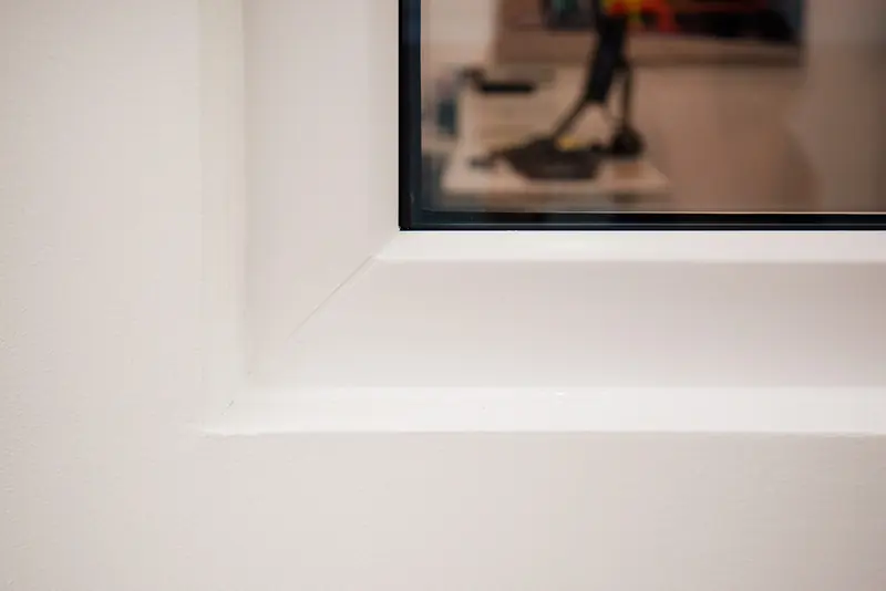 Close-up of a plastered window reveal