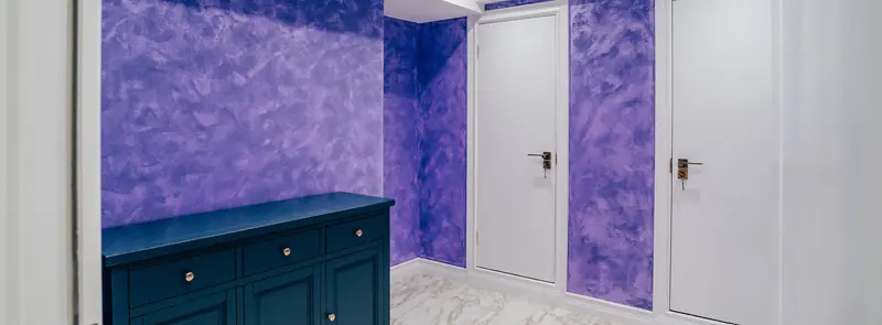 Corridor with purple polished plaster walls
