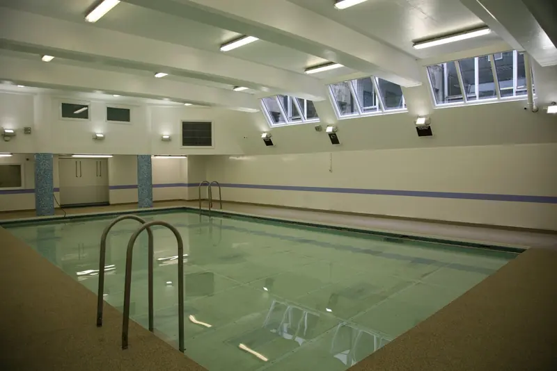 Indoor swimming pool hall with roof lights