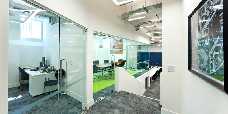 Office with glass partitions and artwork after a Craftex fit-out