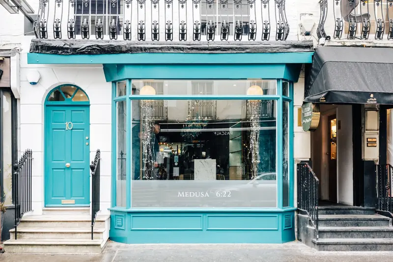 Shopfront refurbishment with a turquoise door
