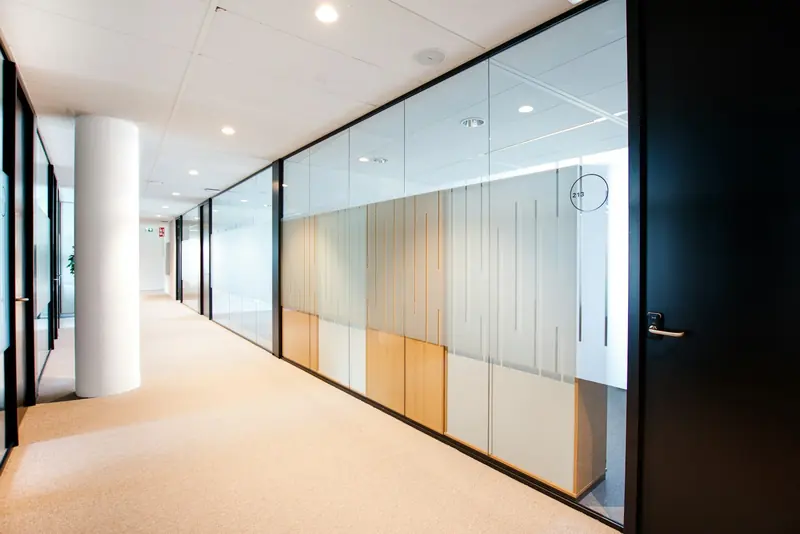Corridor of glazed office partitions