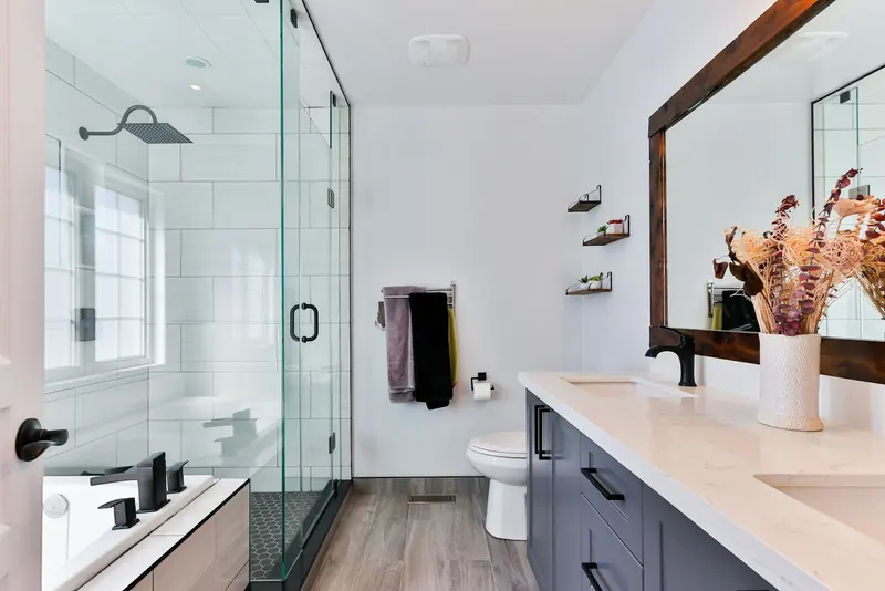 Finished bathroom with walk-in shower and vanity