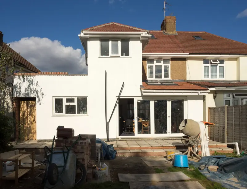 Finished rendered rear extension with French doors