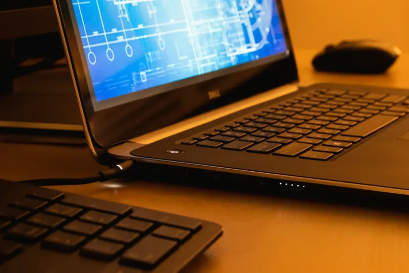 Laptop showing a technical drawing on screen