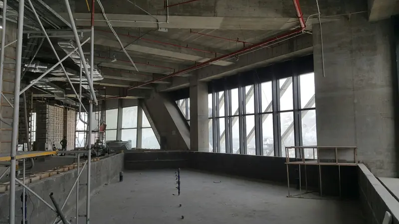 Office floor stripped back to the concrete frame with access scaffold