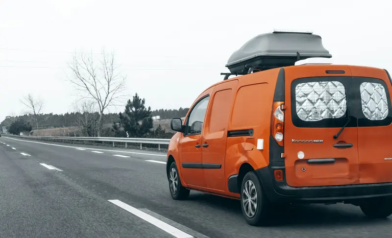 Orange van on the road