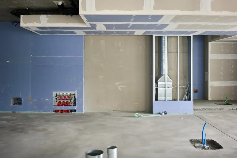 Plasterboard partitions and services in a commercial fit-out