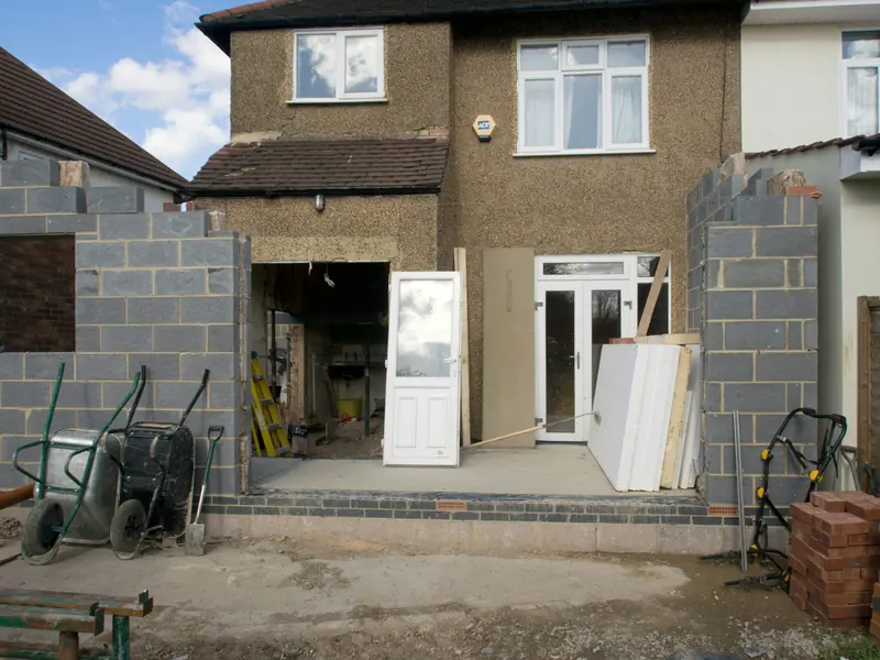 Rear extension walls going up in blockwork around the back of a house