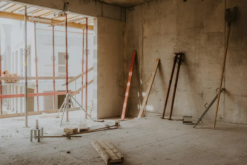 Room with scaffold towers during a refurbishment