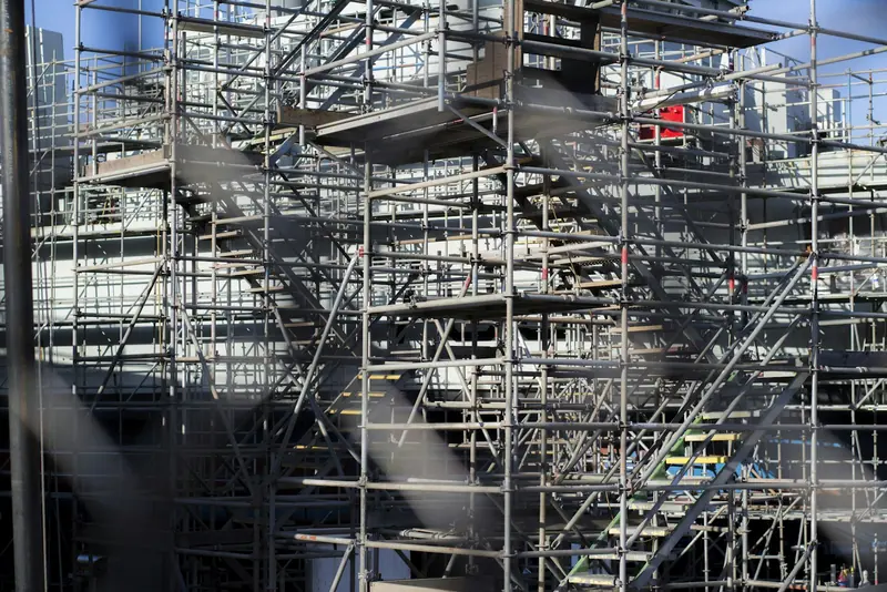 Scaffold with a stair tower on a building being refurbished