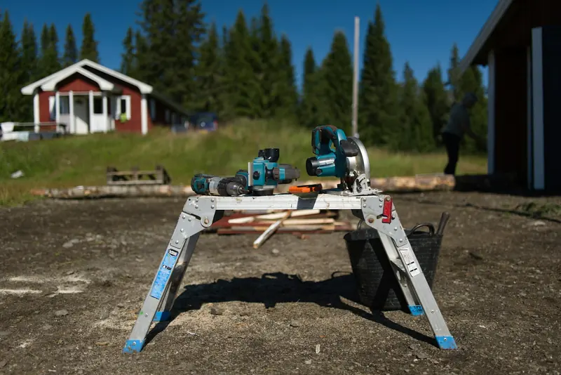 Site workbench with a mitre saw outside