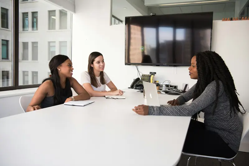Small team meeting in a bright conference room