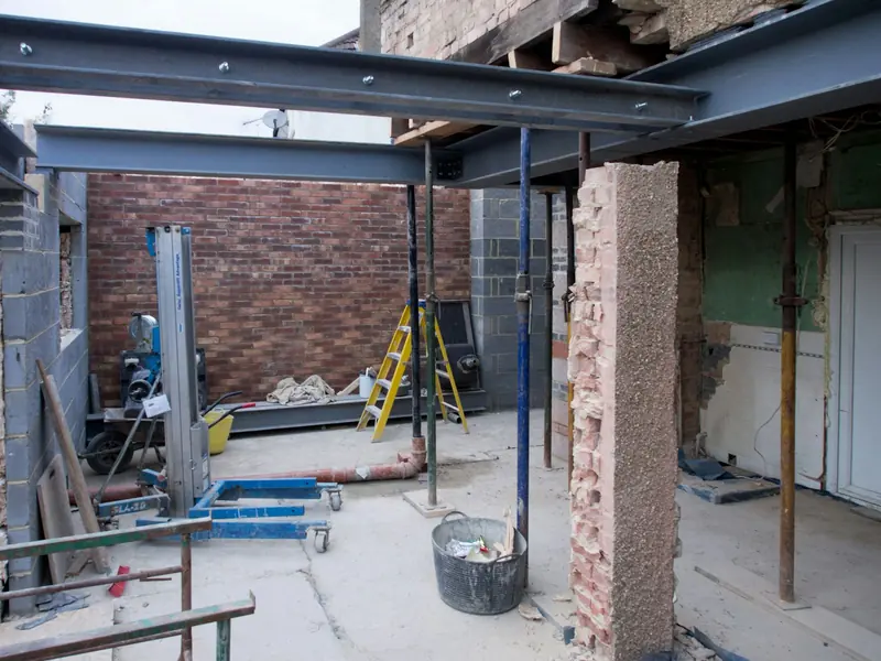Steel beam and props inside a rear extension before the back wall comes out